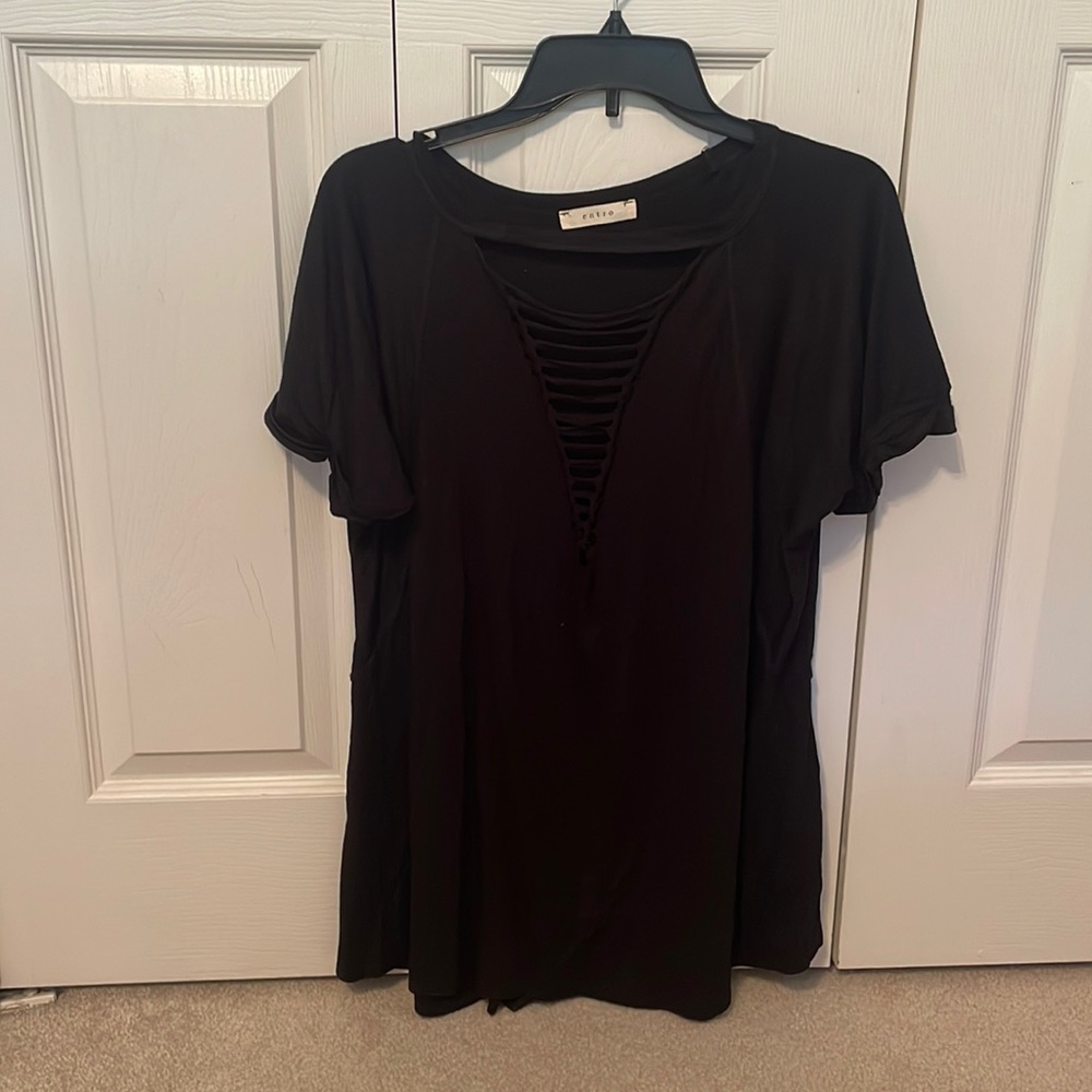 Women’s boutique tee with slits down the front